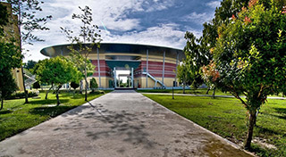 The Library & Auditorium Complex among the campus’ modern, iconic buildings.