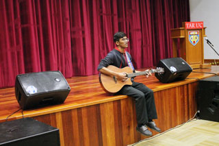 Vasan plucking his guitar and tugging the heartstrings of the audience with his songs.