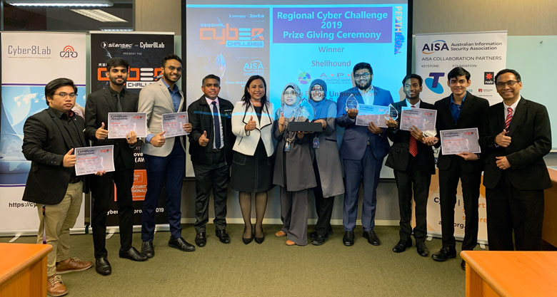 Teams Shellhound and Et3rnal received their awards from Daisy Sinclair, Founder of Cyber8Labs Pty Ltd., Australia (fifth from left), who was the organizer of the Regional Cyber Challenge (RCC) 2019 that took place in Perth, Australia.