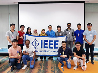 The students with staff of National Instruments.