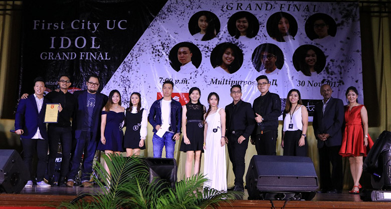 First City UC Idol finalists together with the judges