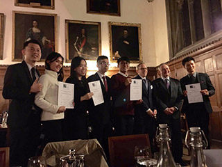 MMU’s fourth year law students (from left) Edwin Lim Chear Win, Leong Men Dy, and Ong Kah Lok (far right) are holding their Powell Gilbert Runners-up for Best Submissions certificates while posing for the camera with fellow Joint Runners Up from University of Hong Kong (HKU) and Mr. Justice Henry Carr (Chancery Division Judge) (second from right), Mr. Peter Damerell (Partner of Powell Gilbert LLP)(third from right) during the prize giving  ceremony in Pembroke College, University of Oxford, UK.