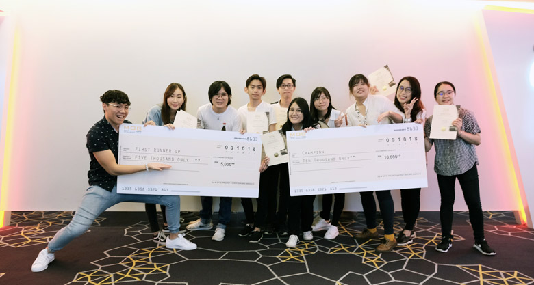 The teams of 'A Touch of Love' and '返 Return' with their Champion and First Runner-up prizes.